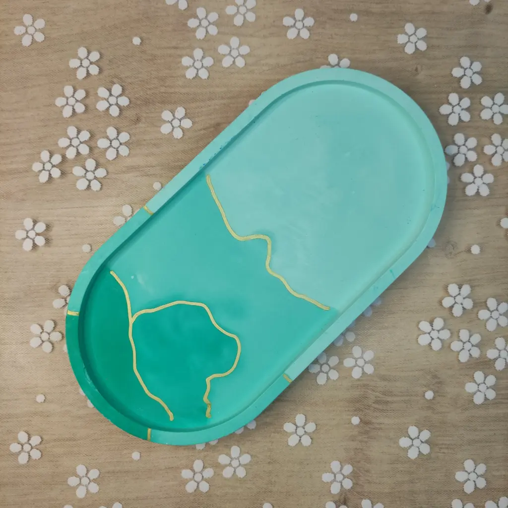 Vide poche Vanua vert et doré