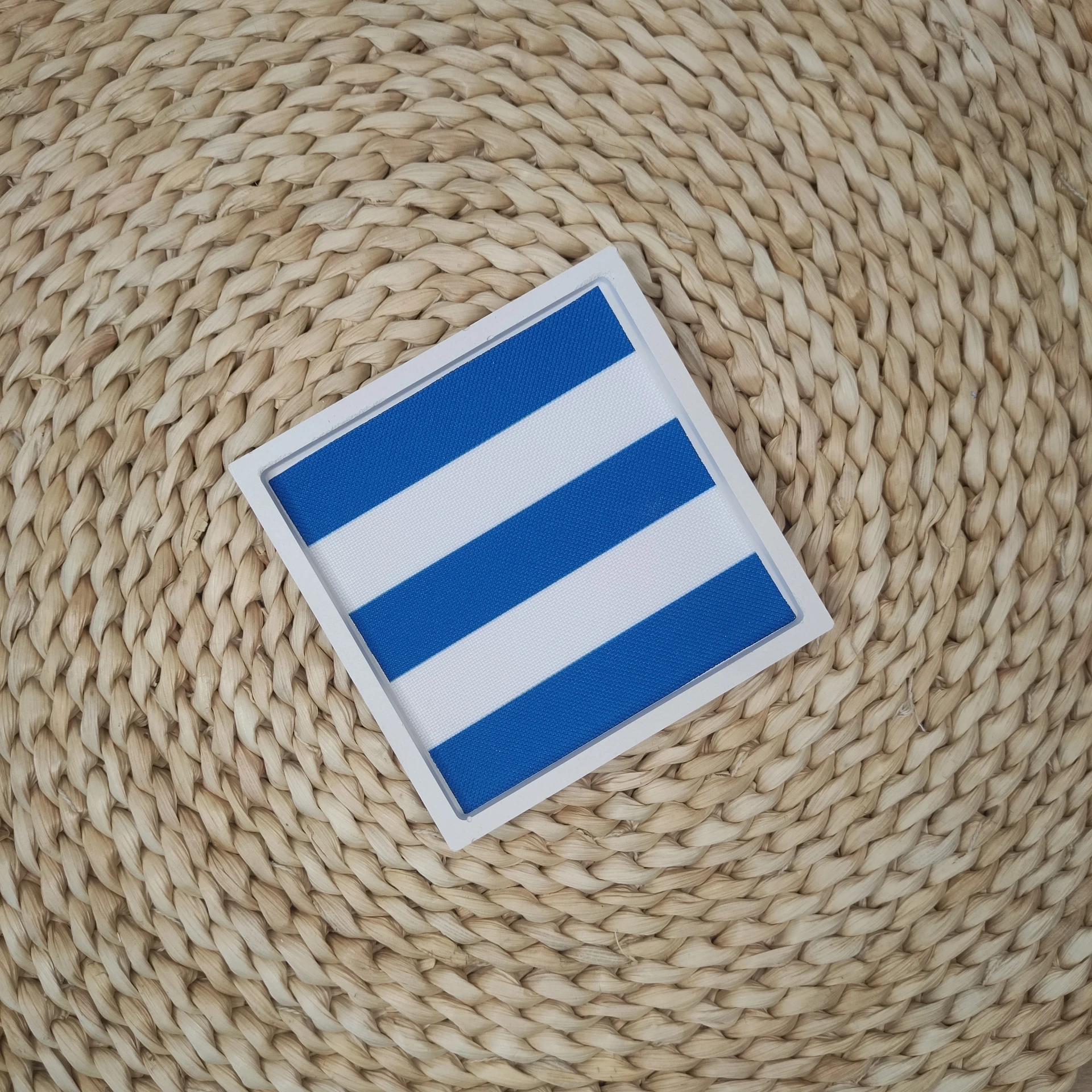 Vide poche Neliö rayé blanc/bleu breton